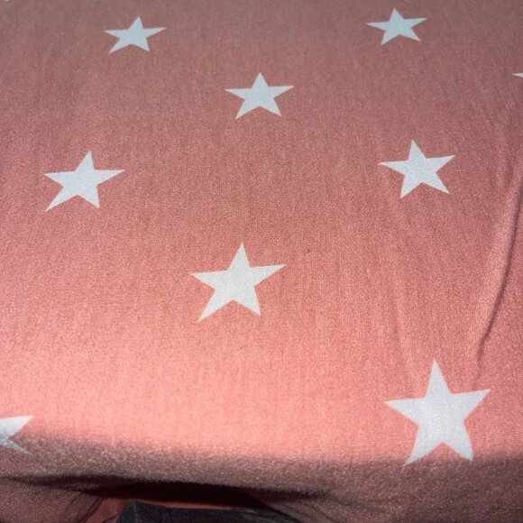 Coral Jersey Knit Fabric with a white star print 52"x60" - Picture 4 of 6